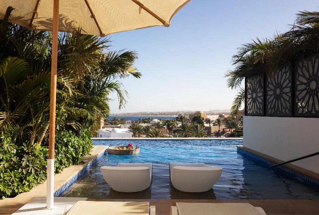 Luxury rooftop pool with panoramic views at Fort Arabesque Resort — Presidential Hospitality Group
