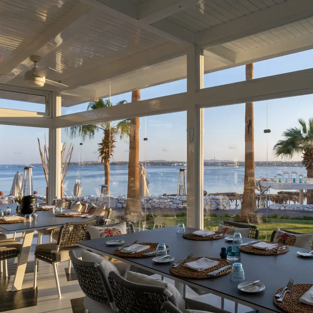 Fine dining at Fort Arabesque Resort — beachfront restaurant with panoramic Red Sea views